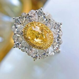 Elegant Yellow and Silver Gemstone Ring